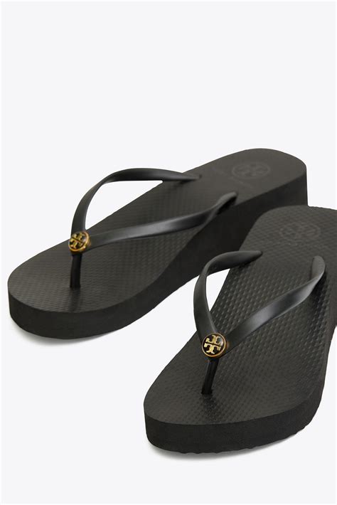 Excellent used condition DD. . Wedge tory burch flip flops